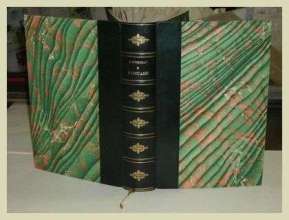 Reliure fin XIX ème dos cuir vert empire, et plats recouverts de papier marbré